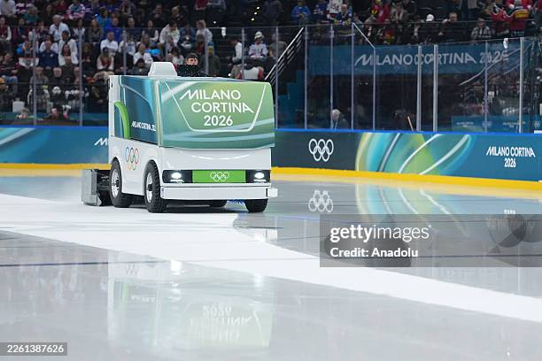 Zamboni machine resurfaces the ice during an intermission in a men's ice hockey Group C match between the USA and Germany at the Milano Santagiulia...