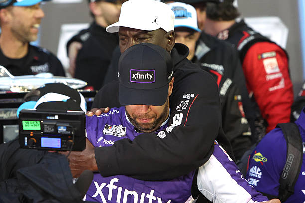 23Xi co-owner Michael Jordan hugs Bubba Wallace after the 68th NASCAR Cup Series Daytona 500 on February 15, 2026 at Daytona International Speedway...