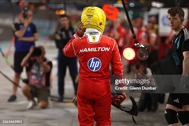 Lewis Hamilton of Great Britain and Scuderia Ferrari in the Pitlane during day three of F1 Testing at Bahrain International Circuit on February 13,...
