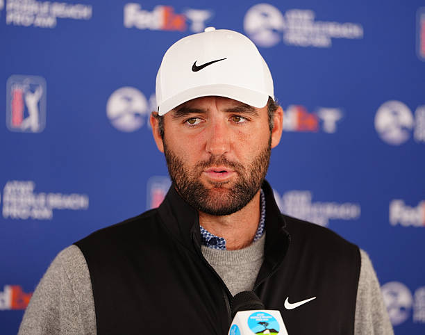 Golfer Scottie Scheffler does an interview after finishing on the 18th hole on February 15 during the final round of the PGA AT&T Pebble Beach Pro-Am...