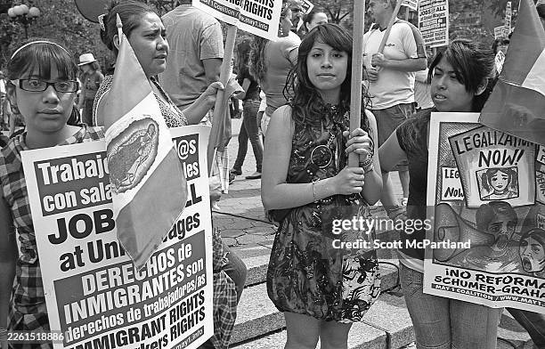 View of demonstrators, many holding signs, during a rally in support of immigrant's rights in Union Square Park, New York, New York, May 1, 2010. The...