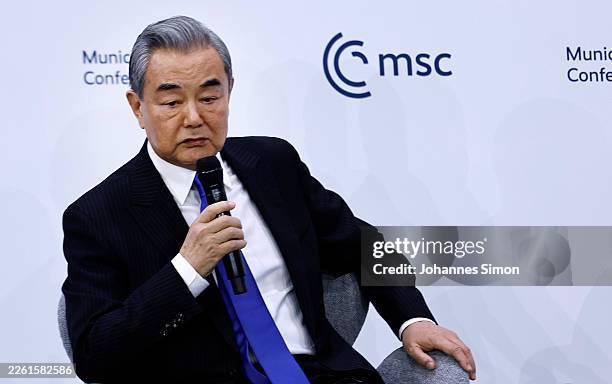 Chinese minister of foreign affairs Wang Yi talks with the MSC chairman Wolfgang Ischinger at the 62nd Munich Security Conference on February 14,...