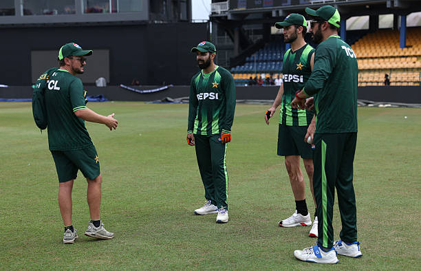 Mike Hesson, Head Coach of Pakistan pictured with Shadab Khan, Shaheen Afridi and Usman Tariq of Pakistan pictured during an ICC Men's T20 World Cup...