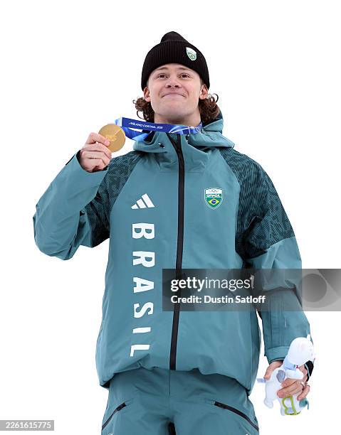 Gold medalist Lucas Pinheiro Braathen of Team Brazil celebrates on the podium following the Men's Giant Slalom on day eight of the Milano Cortina...