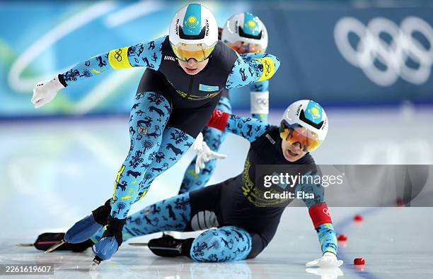 Arina Ilyachshenko of Team Kazakhstan crashes during the quarterfinals of the Speed Skating Women's Team Pursuit on day eight of the Milano Cortina...