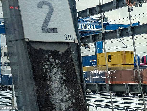 Freight containers and gantry cranes are at the container terminal in Freilassing, Bavaria, Germany, on February 15, 2026. Intermodal rail transport...