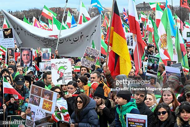 People protesting for human rights in Iran demonstrate at Theresienwiese during the 62nd Munich Security Conference on February 14, 2026 in Munich,...