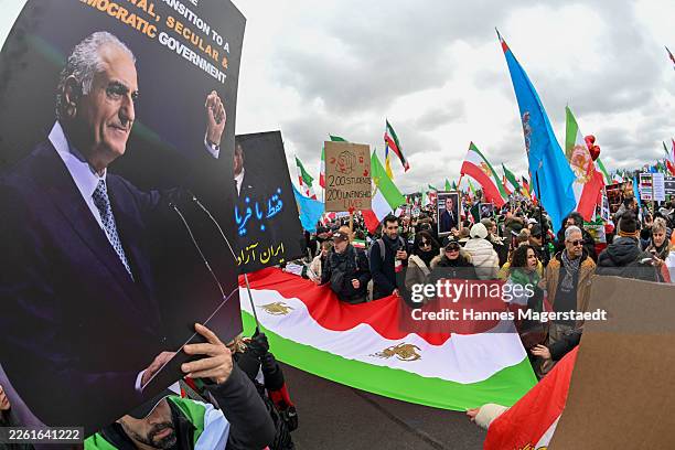 People protesting for human rights in Iran demonstrate at Theresienwiese during the 62nd Munich Security Conference on February 14, 2026 in Munich,...