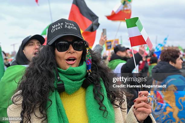 People protesting for human rights in Iran demonstrate at Theresienwiese during the 62nd Munich Security Conference on February 14, 2026 in Munich,...
