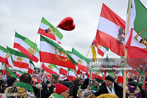 People protesting for human rights in Iran demonstrate at Theresienwiese during the 62nd Munich Security Conference on February 14, 2026 in Munich,...