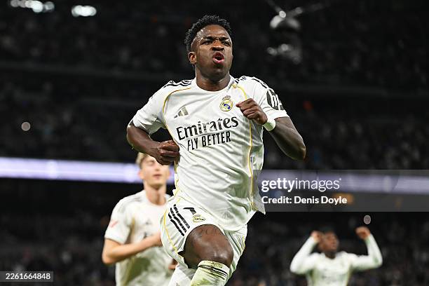 Vinicius Junior of Real Madrid celebrates scoring his team's second goal during the LaLiga EA Sports match between Real Madrid CF and Real Sociedad...