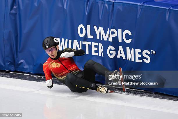 Shaoang Liu of Team People's Republic of China crashes while competing in the Semifinal 1 of the Short Track Speed Skating Men's 1500m on day eight...