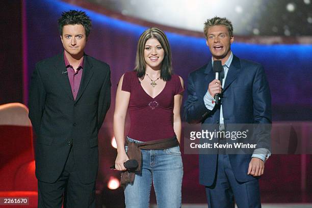 Brian Dunkleman, Kelly Clarkson and Ryan Seacrest at FOX-TV's "American Idol" in Los Angeles, Ca. Wednesday, August 28, 2002. Photo by Kevin...