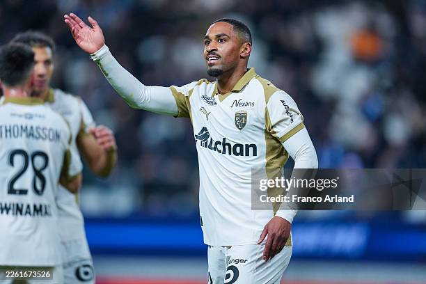 Wesley Said of RC Lens celebrates after scoring his team's first goal during the Ligue 1 McDonald's match between Paris FC and Lens at Stade Jean...