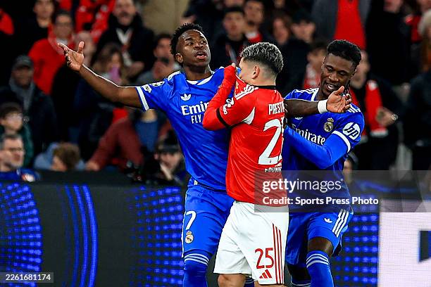 Vinícius Júnior of Real Madrid CF and Gianluca Prestianni of SL Benfica argue during the UEFA Champions League 2025/26 League Knockout Play-off First...
