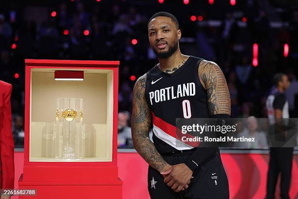 Damian Lillard of the Portland Trail Blazers poses for a photo after winning the State Farm 3-Point Contest during 2026 NBA All-Star Weekend at...