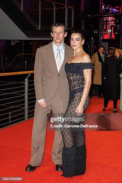 Callum Turner and Dua Lipa attend the "Rosebush Pruning" premiere during the 76th Berlinale International Film Festival Berlin at Berlinale Palast on...
