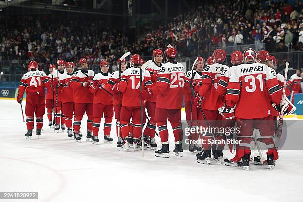 Team Denmark celebrates after defeating Latvia 4-2 in the Men's Preliminary Group C match between Denmark and Latvia on day nine of the Milano...