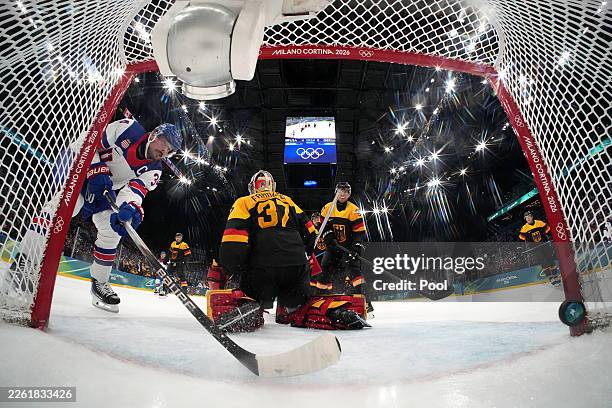 Auston Matthews of Team United States scores a goal against Maximilian Franzreb of Team Germany in the third period during the Men's Preliminary...