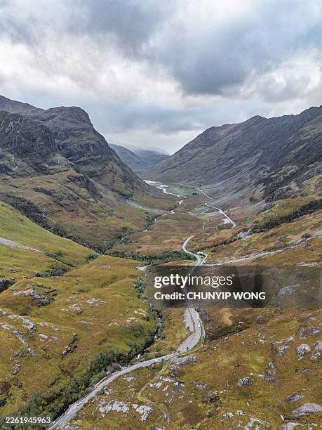 glencoe valley and the three sisters mountains, scottish highlands - glencoe valley stock pictures, royalty-free photos & images