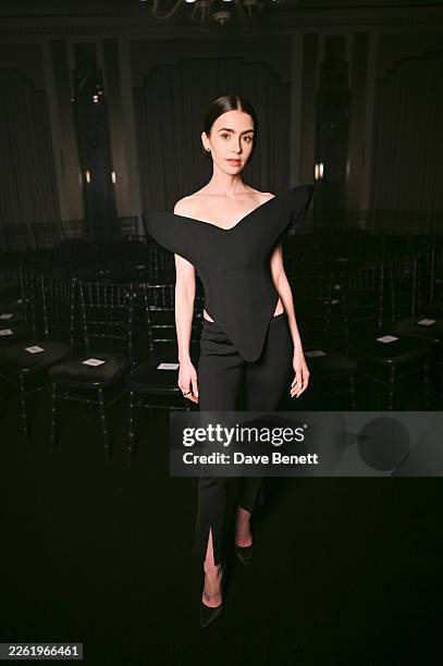 Lily Collins attends the Harris Reed Autumn / Winter 2026 show during London Fashion Week at Claridge's Hotel on February 19, 2026 in London, England.
