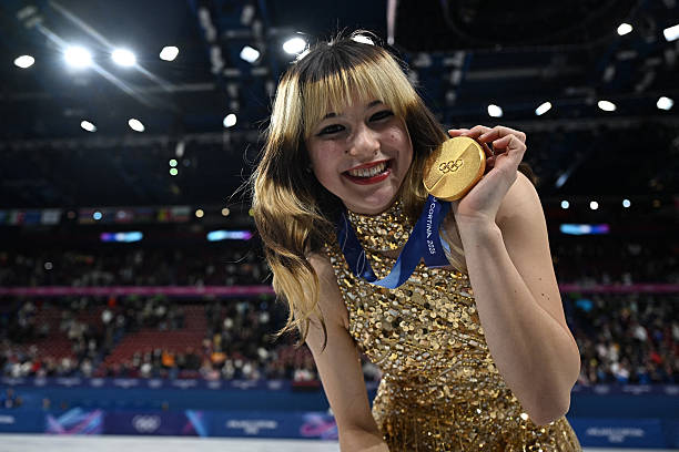Gold medallist USA's Alysa Liu poses with her medal following the victory ceremony of the figure skating women's single free skating final during the...