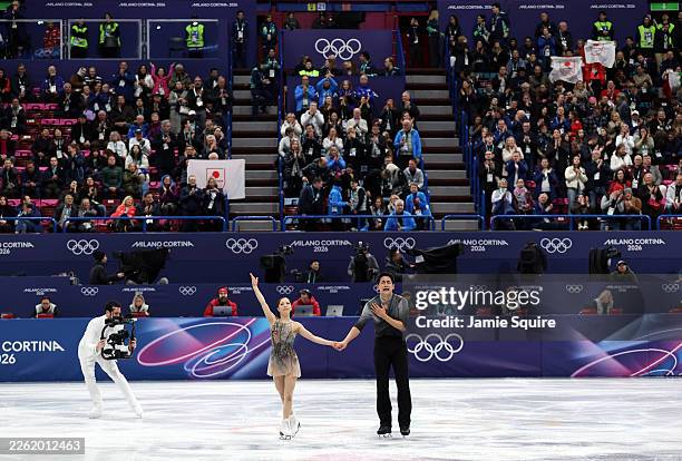 Riku Miura and partner Ryuichi Kihara of Team Japan react after competing during Pair Skating - Free Skating on day ten of the Milano Cortina 2026...