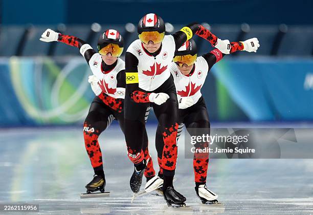 Isabelle Weidemann, Valerie Maltais and Ivanie Blondin of Team Canada compete in the semi-final of the Speed Skating Women's Team Pursuit on day...