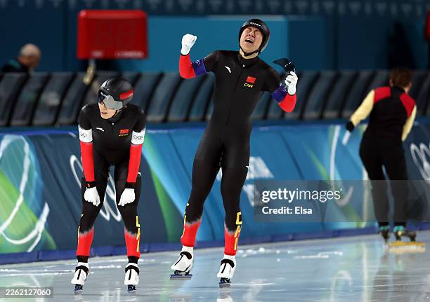 Hanbin Liu and Wenhao Li of Team People's Republic of China react after winning bronze in final B of the Speed Skating Men's Team Pursuit on day...