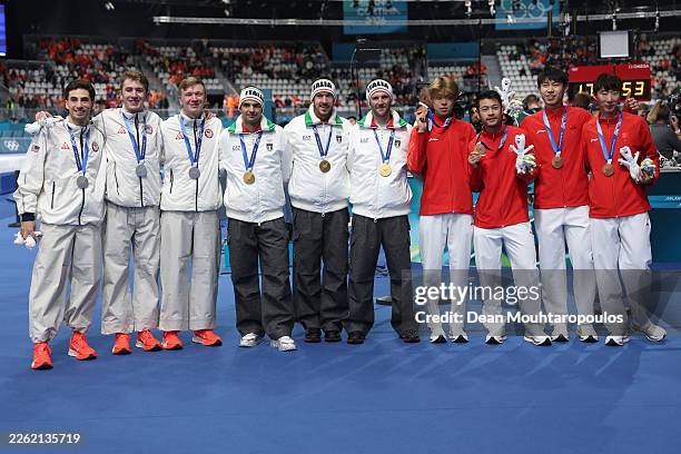 Gold medalists Team Italy, Silver medalists Team United States and Bronze medalists Team People’s Republic of China pose for a photo after the medal...