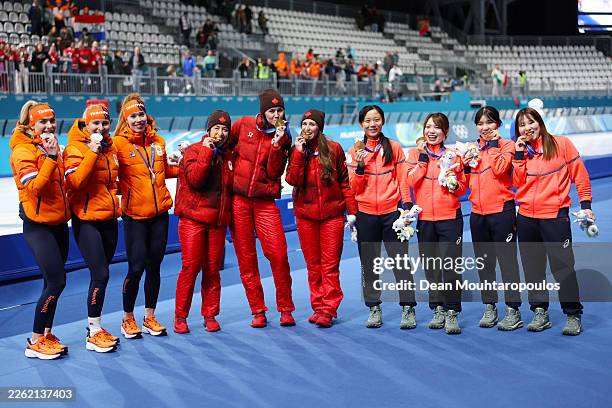 Gold medalists Team Canada, Silver medalists Team Netherlands and Bronze medalists Team Japan pose for a photo after the medal ceremony for the Speed...