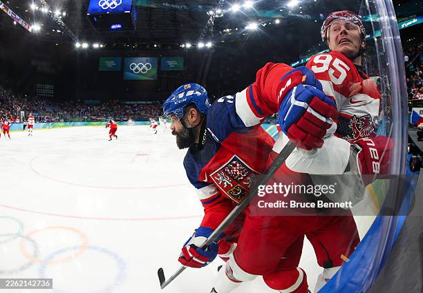 Radko Gudas of Team Czechia and Nick Olesen of Team Denmark compete for the puck in the second period during the Men's Qualification Playoff match...