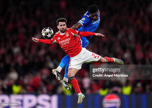 Aurelien Tchouameni of Real Madrid jumps for the ball with Bruma of Benfica during the UEFA Champions League 2025/26 League Knockout Play-off First...