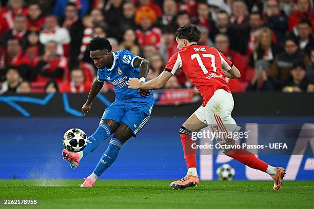 Vinicius Junior of Real Madrid scores his team's first goal during the UEFA Champions League 2025/26 League Knockout Play-off First Leg match between...