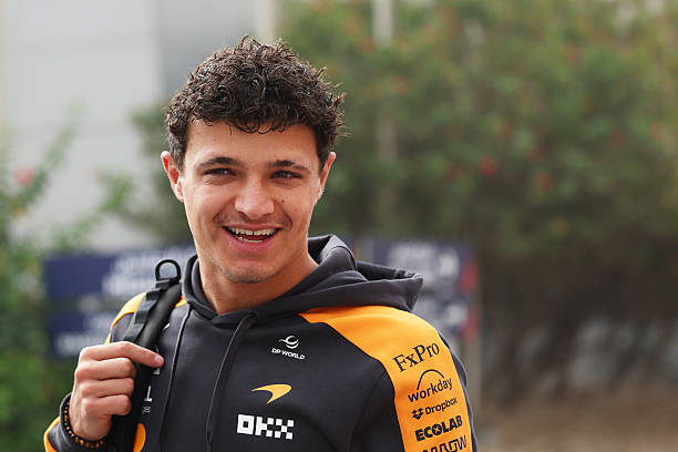 Lando Norris of Great Britain and McLaren arrives in the Paddock during day one of F1 Testing at Bahrain International Circuit on February 18, 2026...