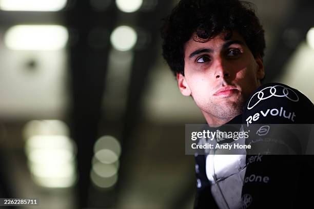 Gabriel Bortoleto of Brazil and Audi F1 Team looks on in the garage during day one of F1 Testing at Bahrain International Circuit on February 18,...