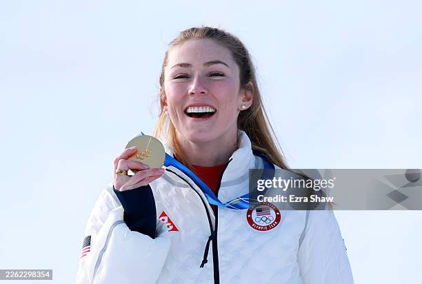 Gold medalist Mikaela Shiffrin of Team United States celebrates on the podium during the medal ceremony following the Women's Slalom Run on day...