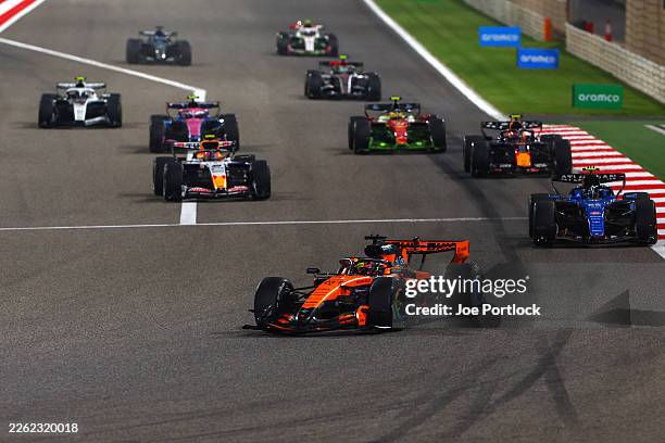 Oscar Piastri of Australia driving the McLaren MCL40 Mercedes leads Carlos Sainz of Spain driving the Williams FW48 Mercedes Liam Lawson of New...