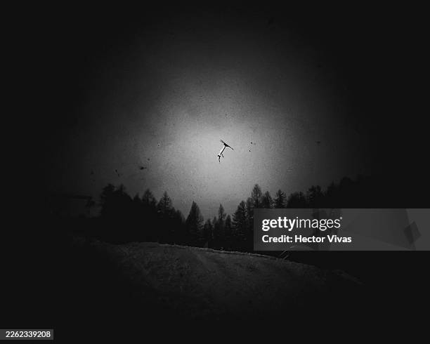 An athlete competes during Women's Aerials Qualification on day twelve of the Milano Cortina 2026 Winter Olympic games at Livigno Air Park on...
