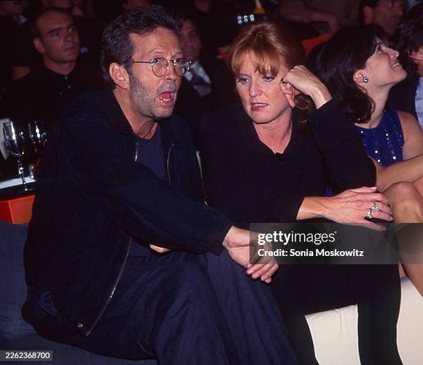 Eric Clapton, Sarah Ferguson and Stephanie Seymour attend a Giorgio Armani party at the Lexington Avenue Armory on September 12, 1996 in New York...