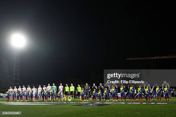 Match officials, players and mascots line up on the pitch prior to the UEFA Conference League 2025/26 Knockout Play-off First Leg match between HSK...