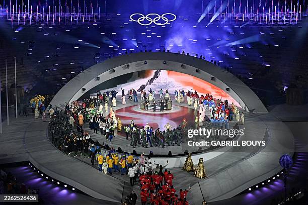 Flagbearers parade during the closing ceremony of the Milano Cortina 2026 Winter Olympic Games at the Verona Arena in Verona, northern Italy, on...