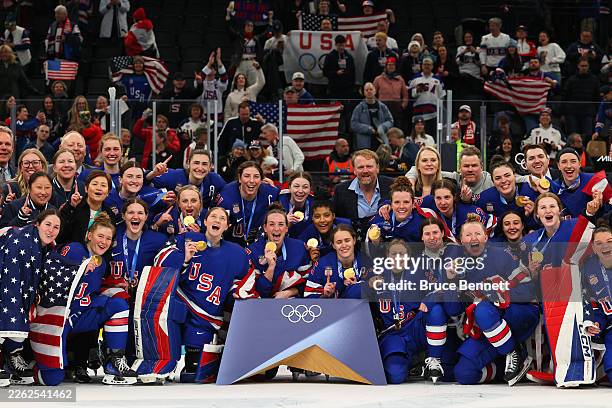 Gold medalist Team United States pose after the medal ceremony for the Ice Hockey Women following the Women's Gold Medal match between the United...
