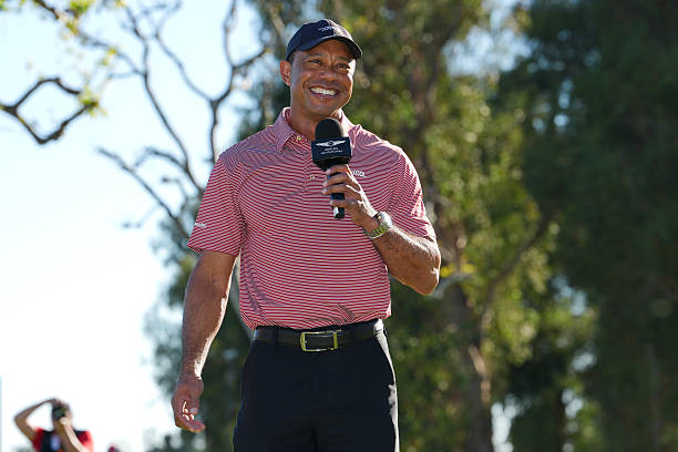Tiger Woods, tournament host, smiles on the 18th green after the final round of The Genesis Invitational at The Riviera Country Club on February 22,...