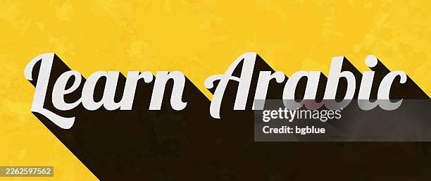 learn arabic - text with long shadow on textured yellow background - arabic font stock illustrations