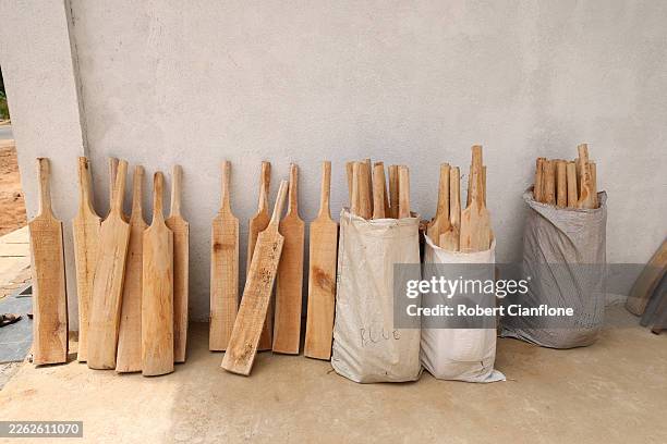 Hand made cricket bats are seen for sale on the side of the Colombo to Kandy Highway on February 20, 2026 in Colombo, Sri Lanka.