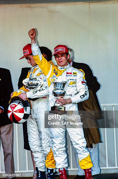 Race winner Giancarlo Fisichella celebrates victory on the podium with Sascha Maassen, 3rd position, alongside after the Formula Three Monaco Grand...