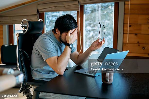 man experiencing remote work burnout and stress - cognitive computing stock pictures, royalty-free photos & images