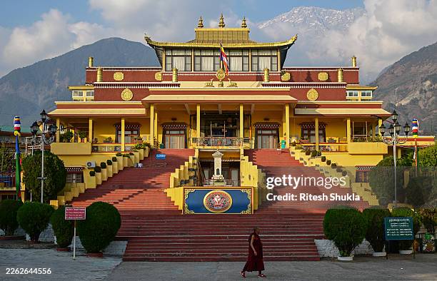 Tibetan Monk-in-exile walks past Gyuto Tantric Monastery on the third day of Losar, The Tibetan New year, on February 20, 2026 in Dharamsala, India....