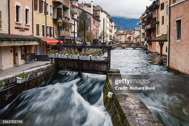 Flow valves are fully open to regulate the Thiou river, the shortest river in France, on February 20, 2026 in Annecy, France. The Thiou's flow rate...